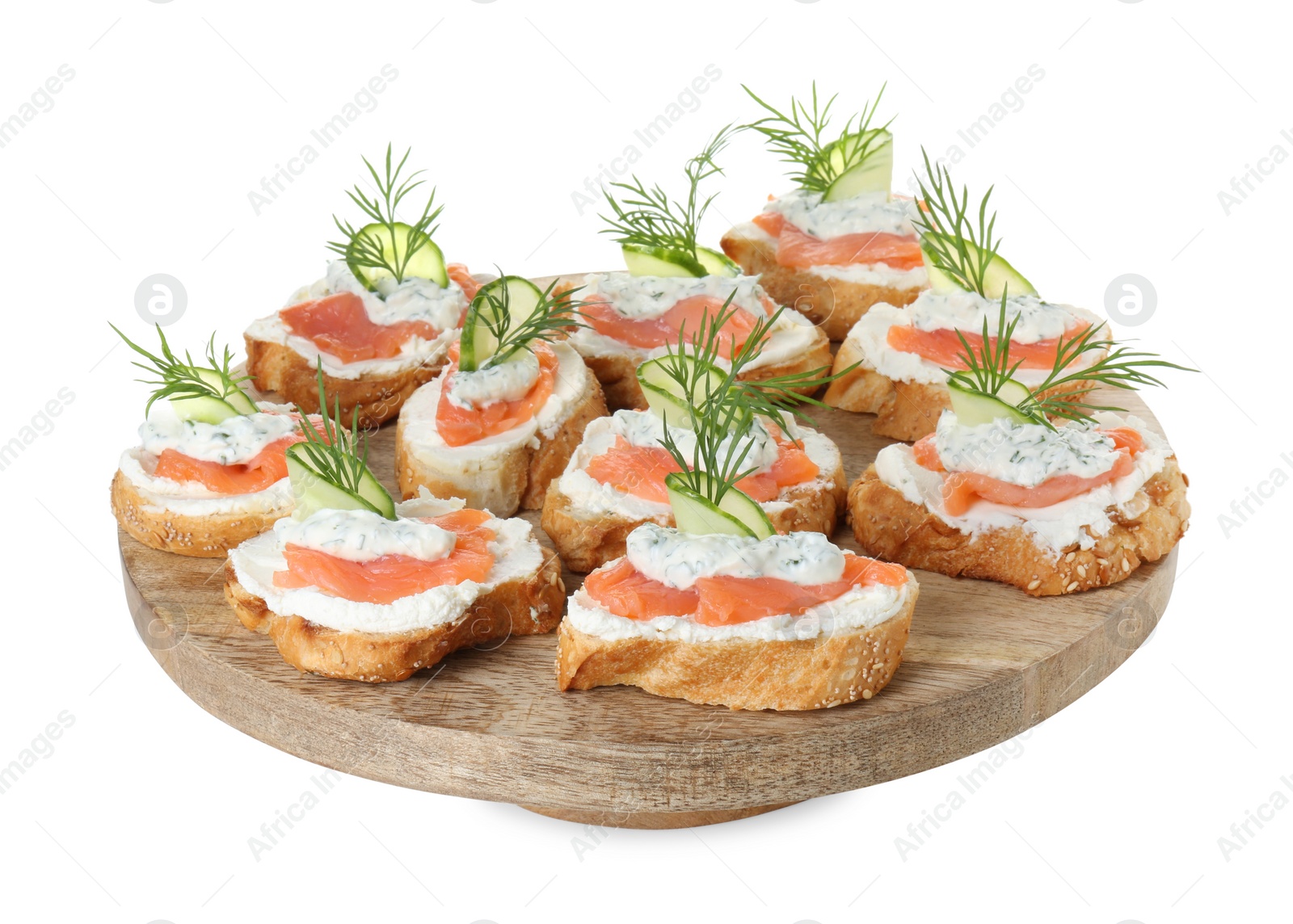 Photo of Tasty canapes with salmon, cucumber, cream cheese and dill isolated on white