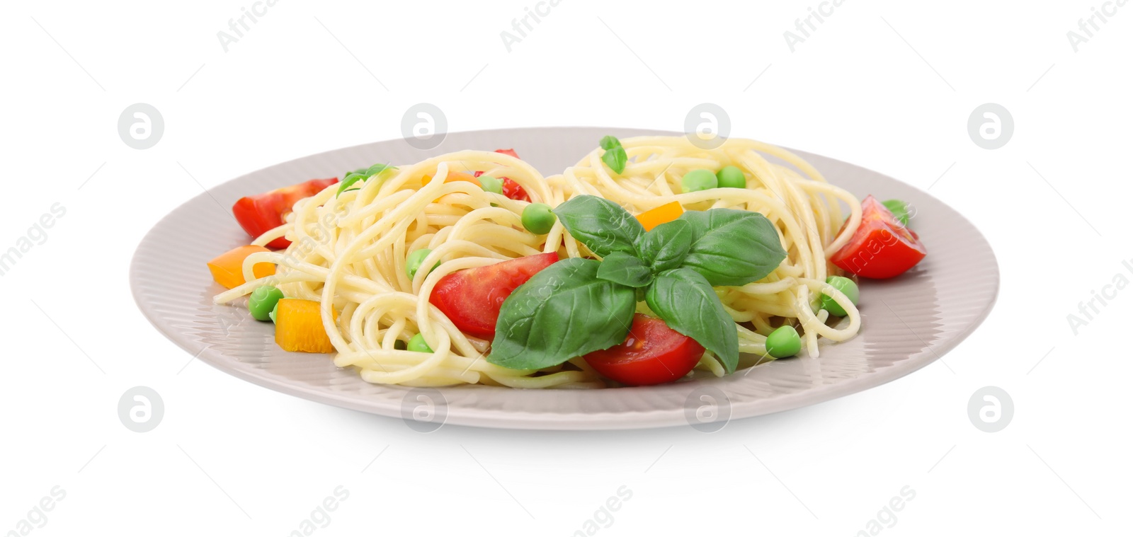 Photo of Plate of delicious pasta primavera isolated on white