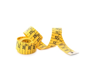 Photo of Long yellow measuring tape isolated on white