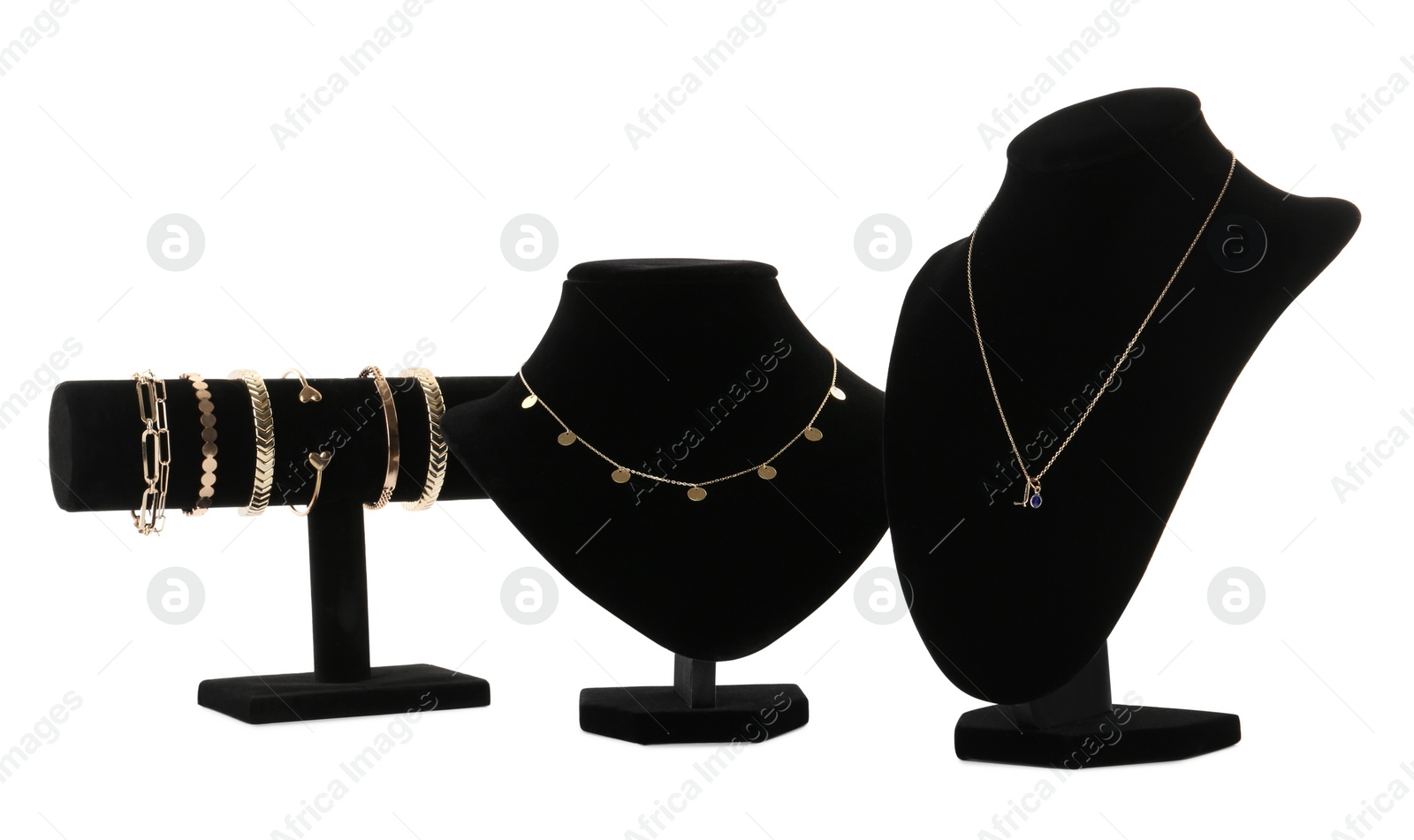 Photo of Different display stands with stylish jewelry on white background