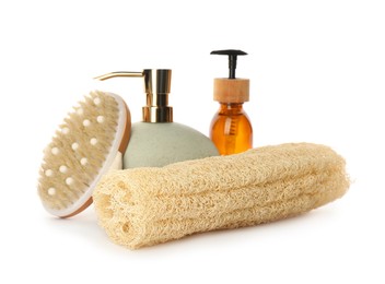 Photo of Set of toiletries with natural loofah sponge on white background