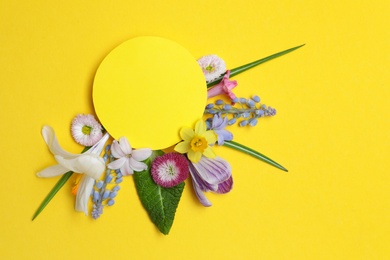 Photo of Flat lay composition with spring hyacinth flowers and blank card on color background, space for text