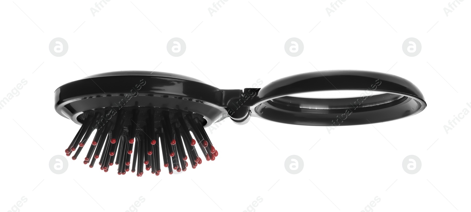 Photo of Round folding hair brush with mirror isolated on white