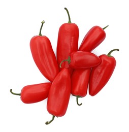 Photo of Fresh raw red hot chili peppers isolated on white, top view