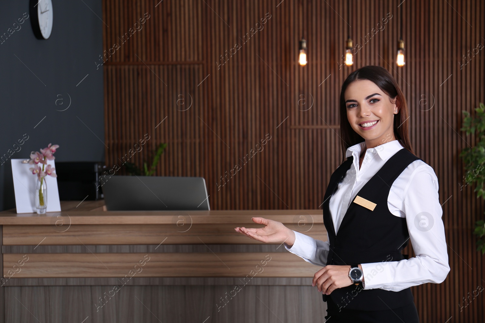 Photo of Portrait of receptionist at desk in lobby