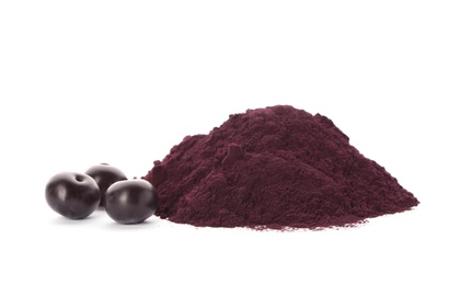 Pile of acai powder and berries on white background