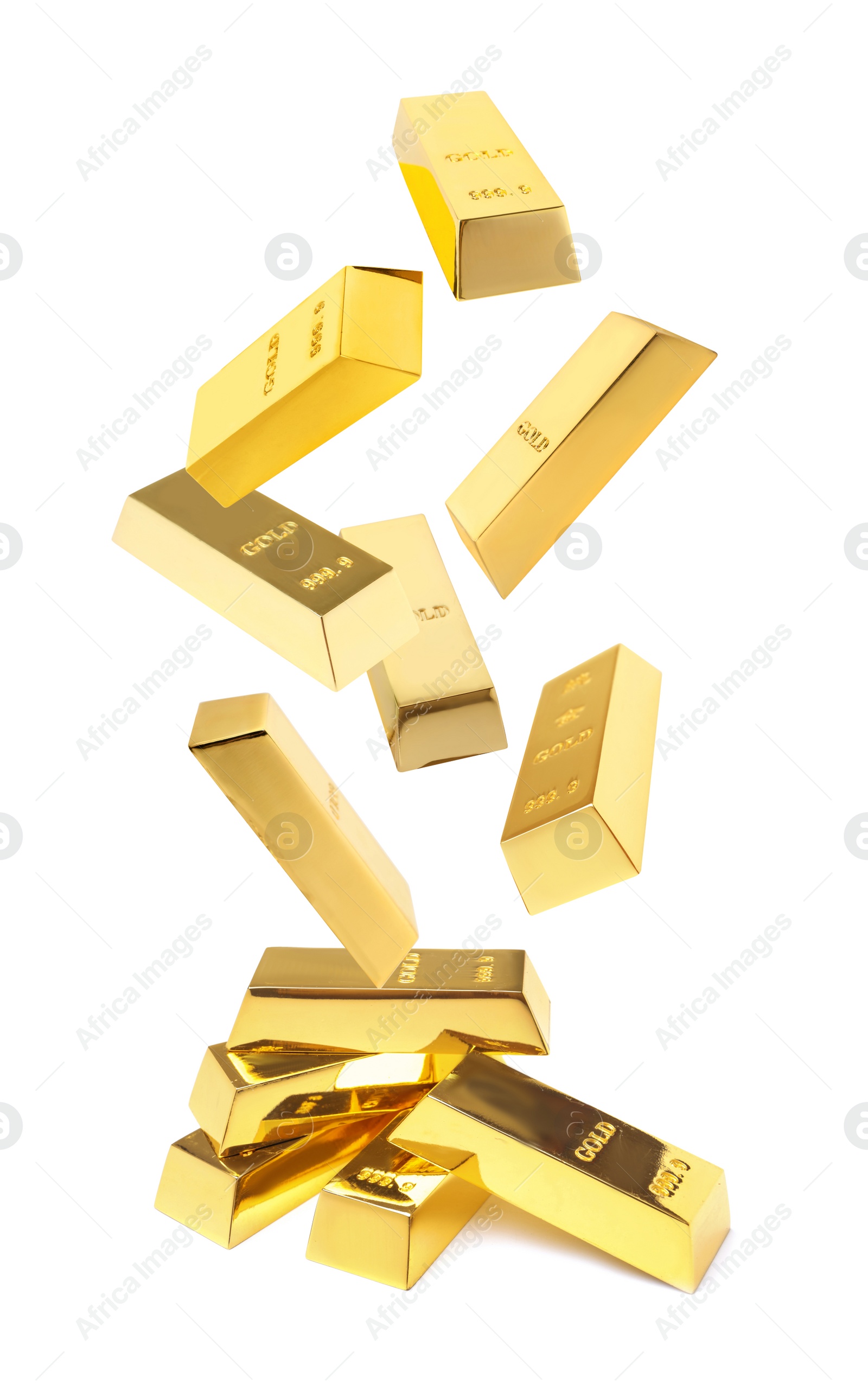 Image of Shiny gold bars falling onto heap on white background