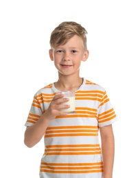 Adorable little boy with glass of milk on white background