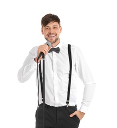 Photo of Handsome man in formal clothes posing with microphone on white background