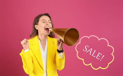 Image of Young woman with megaphone on pink background