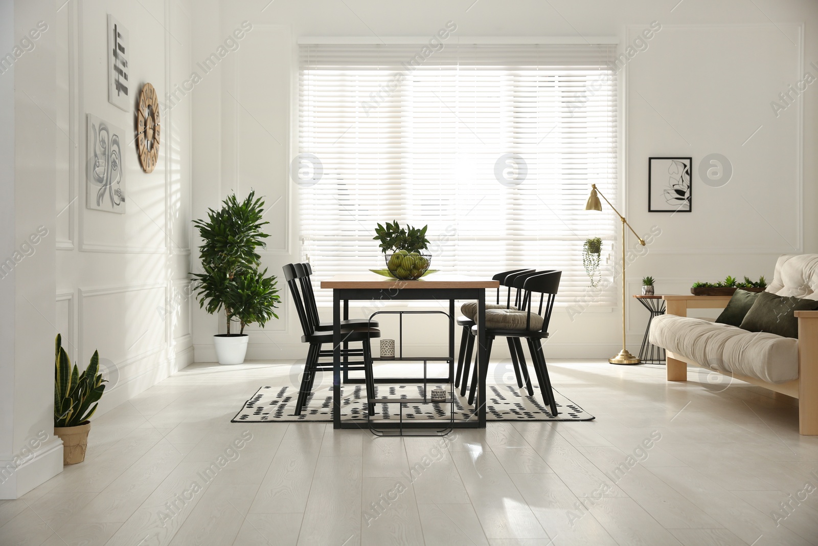 Photo of Stylish wooden dining table and chairs in room. Interior design