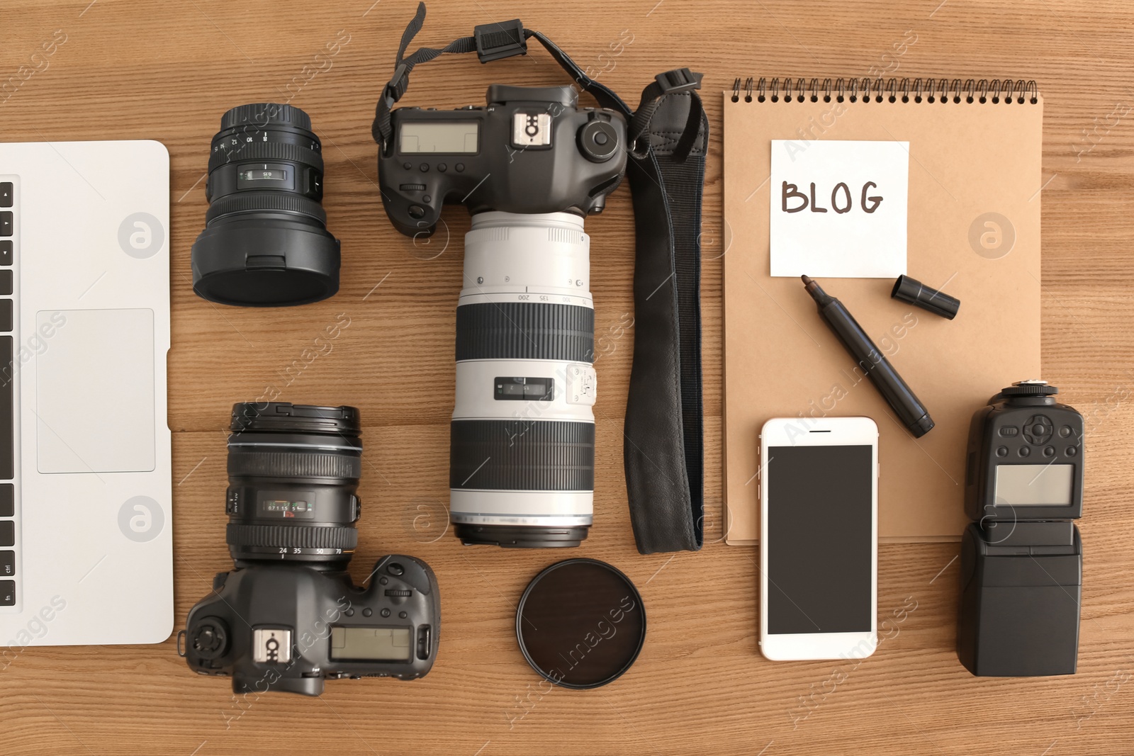 Photo of Flat lay composition with different blogger equipment on wooden background