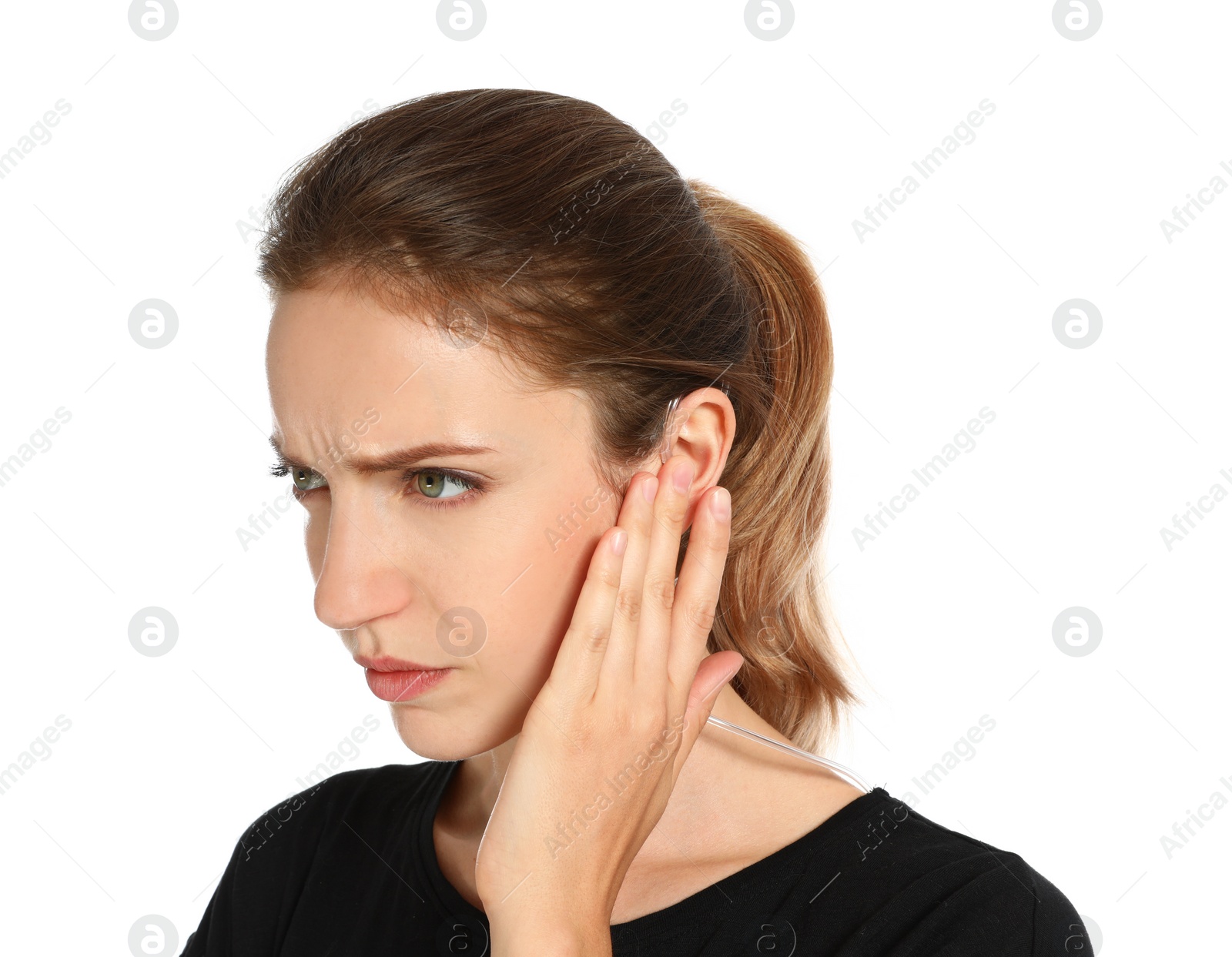 Photo of Female security guard using radio earpiece on white background