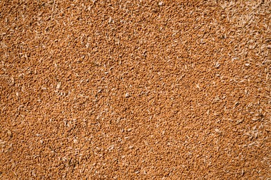 Pile of wheat grains as background, closeup view