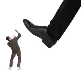 Giant stepping onto small man on white background