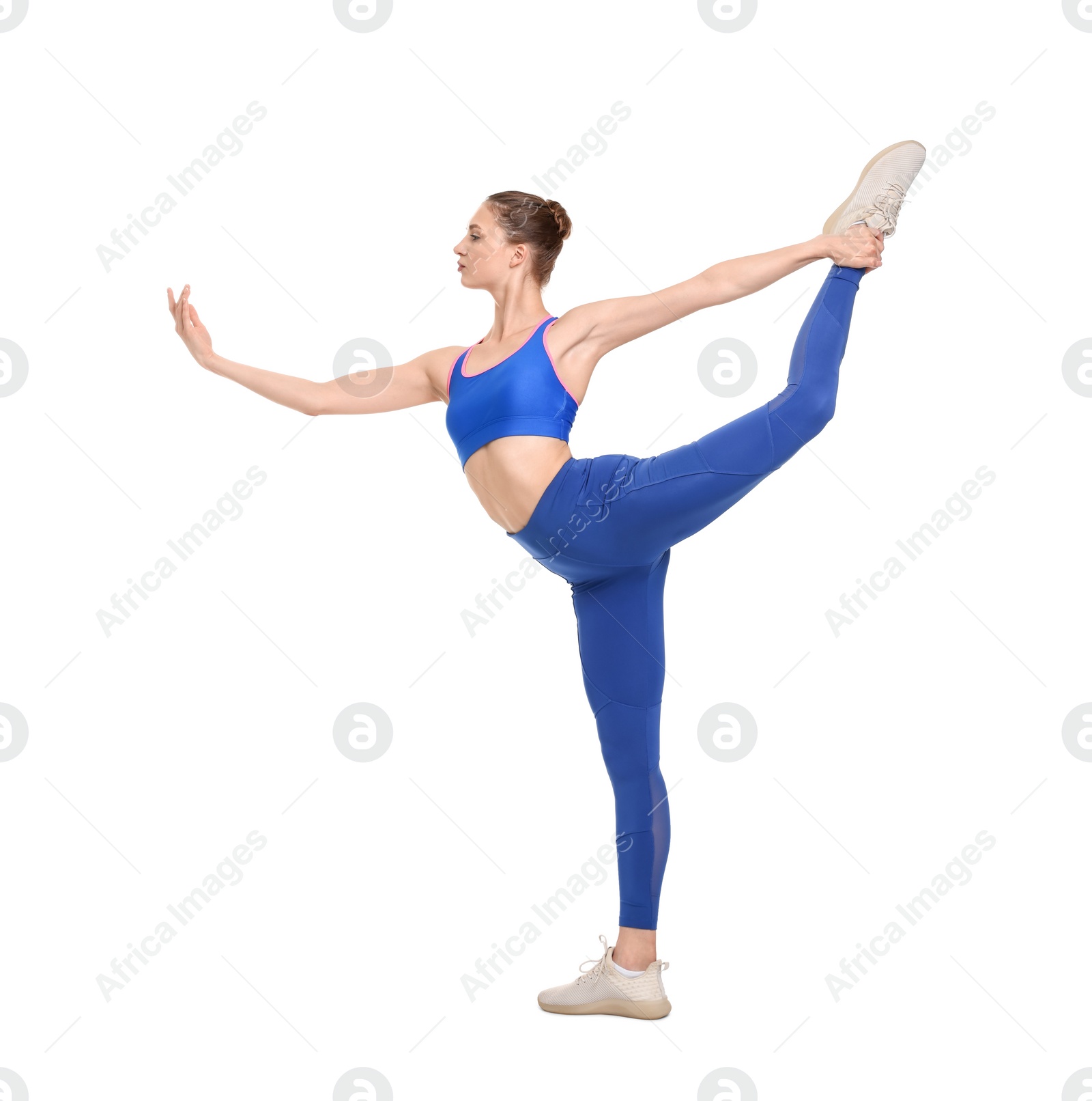 Photo of Young woman practicing yoga on white background