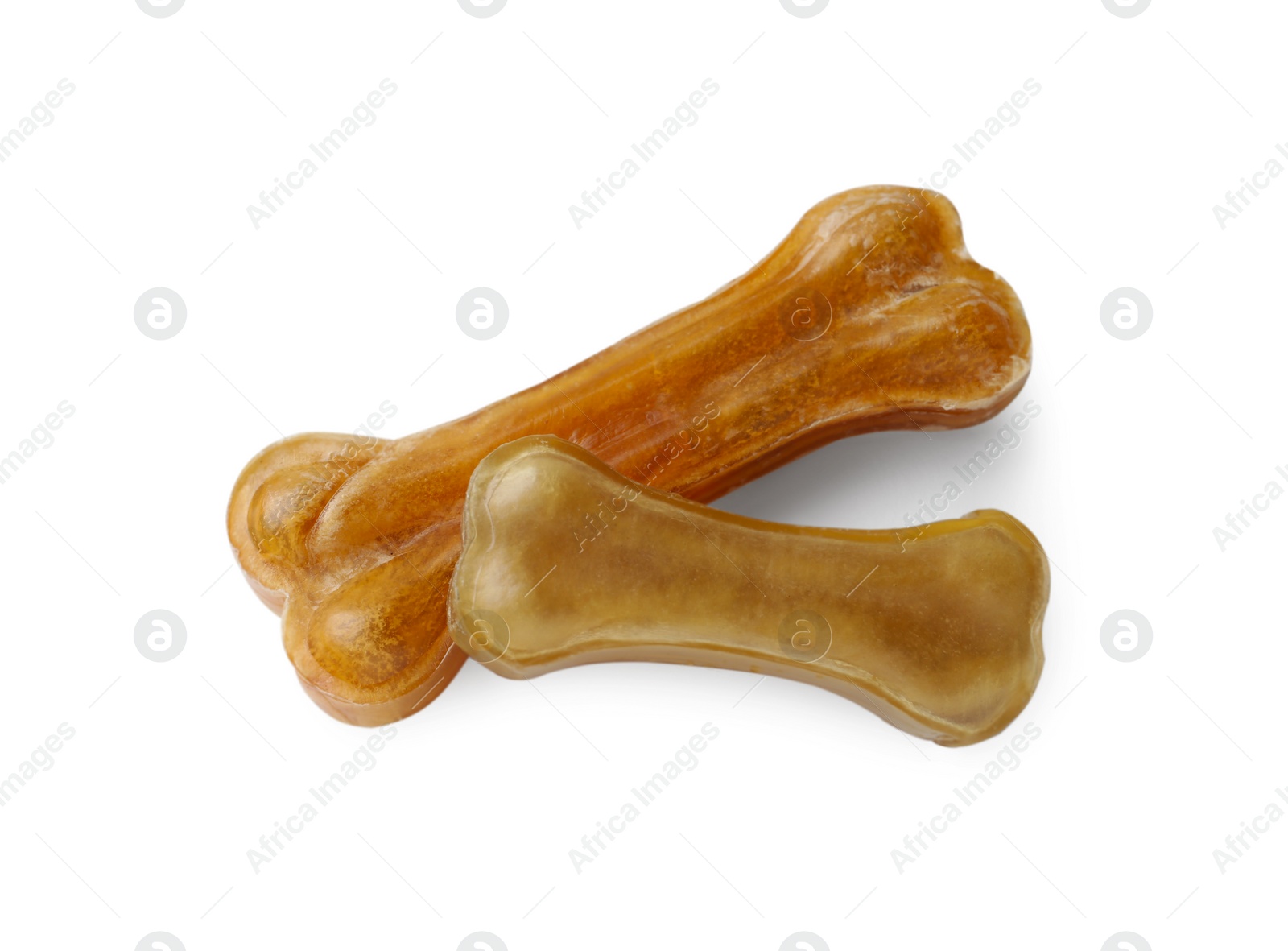 Photo of Chew bones for dog isolated on white. Pet toys