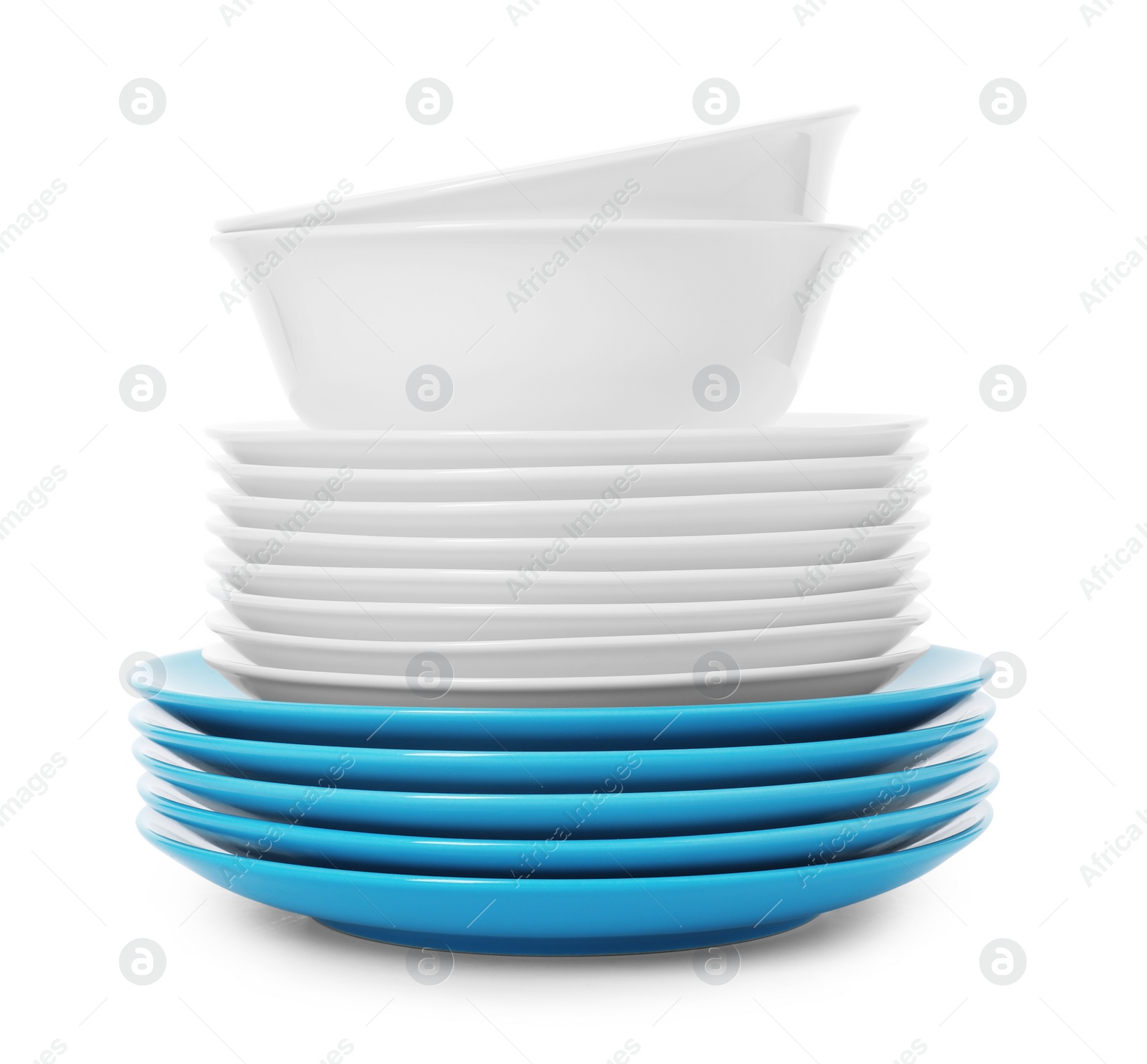 Photo of Stack of clean plates and bowls on white background. Washing dishes