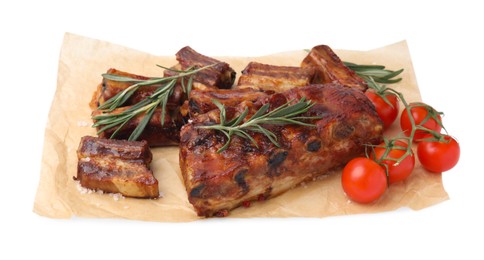 Photo of Tasty roasted pork ribs, rosemary and tomatoes isolated on white