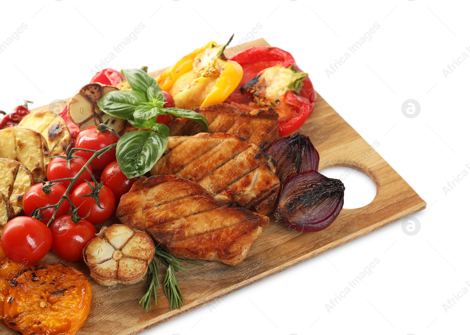 Photo of Wooden board with tasty grilled vegetables, meat, rosemary and basil isolated on white