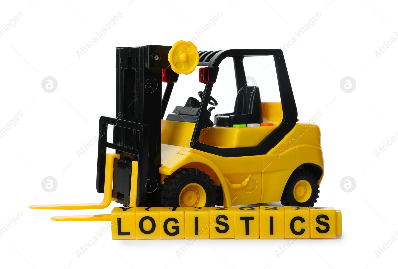Photo of Toy forklift and cubes with word LOGISTICS isolated on white. Wholesale concept