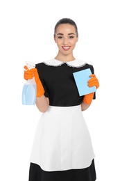 Young chambermaid with rag and detergent on white background