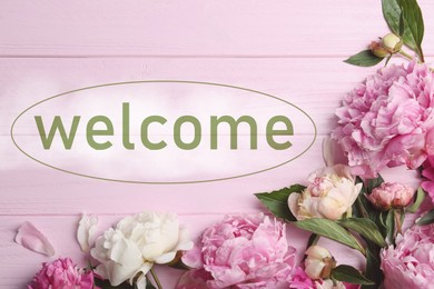 Image of Beautiful peonies and word WELCOME on pink wooden table, flat lay