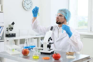 Quality control. Food inspector checking safety of products in laboratory
