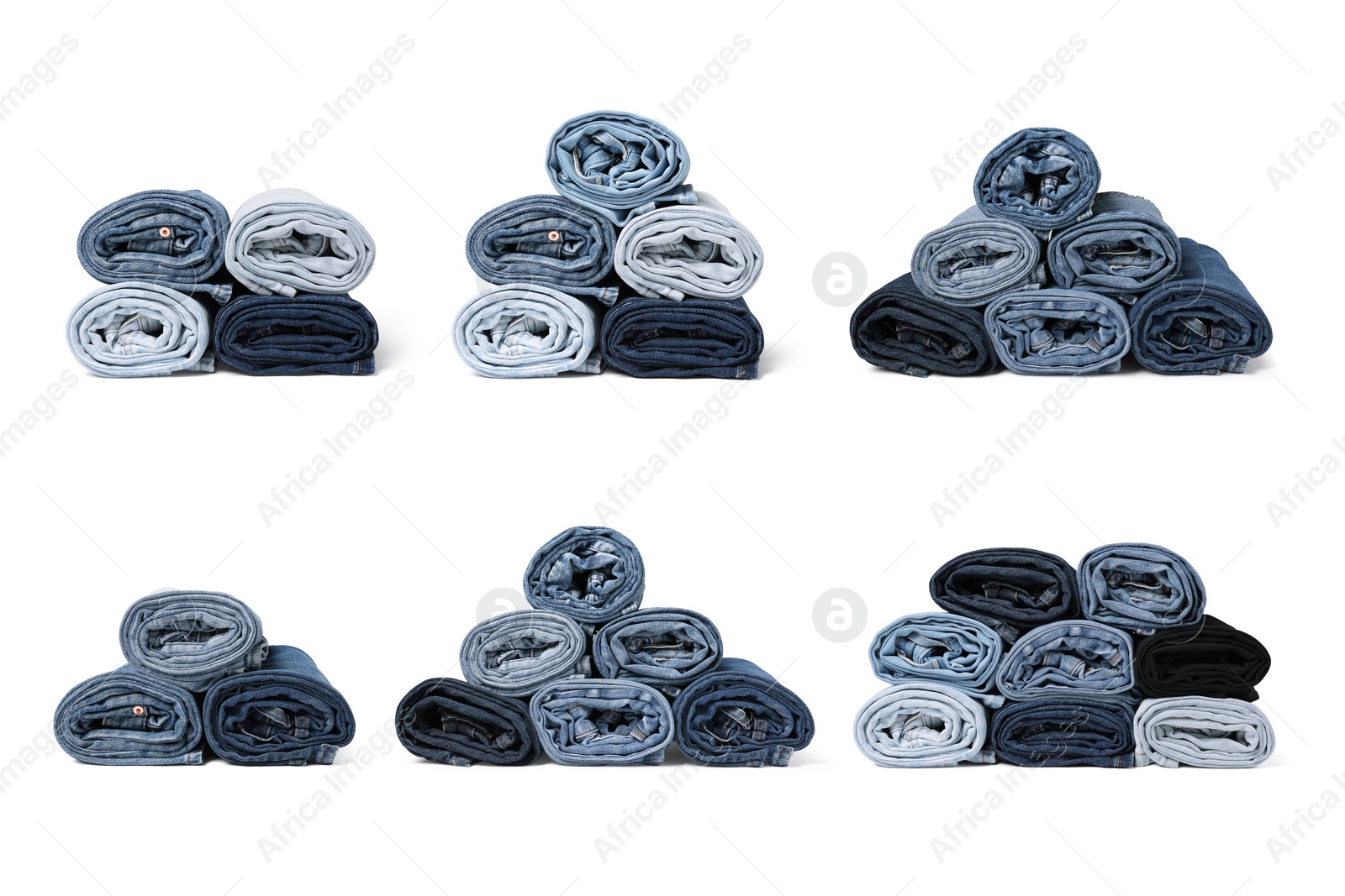 Image of Set with rolled different jeans on white background