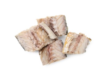 Photo of Delicious canned mackerel chunks on white background, top view
