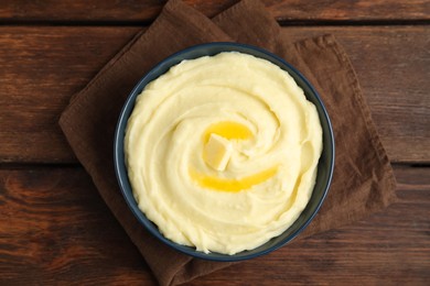 Freshly cooked homemade mashed potatoes on wooden table, top view