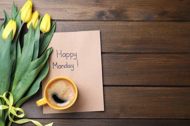 Happy Monday message, aromatic coffee and tulips on wooden table, flat lay. Space for text