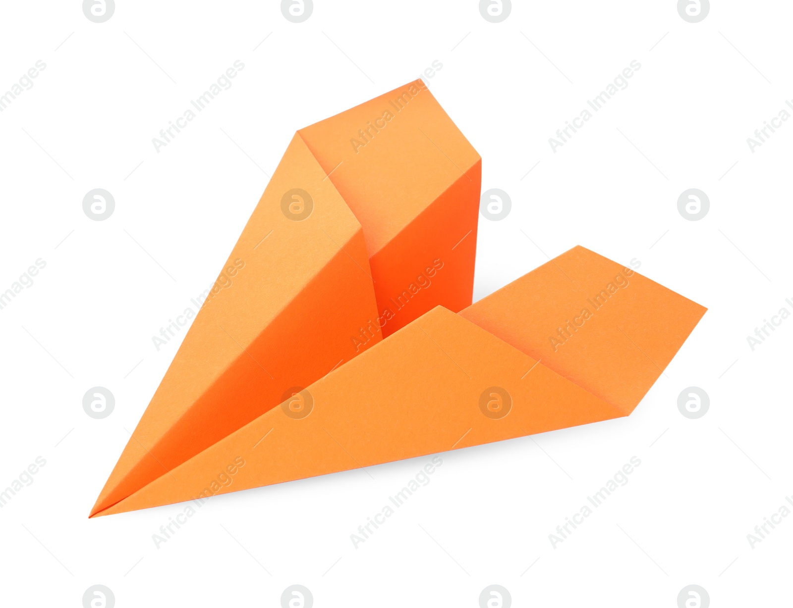 Photo of Handmade orange paper plane isolated on white