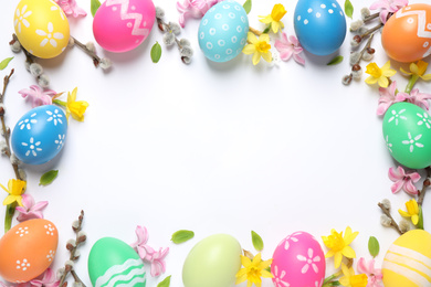 Photo of Frame made with Easter eggs on white background, flat lay. Space for text