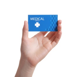 Woman holding business card isolated on white, closeup. Medical service