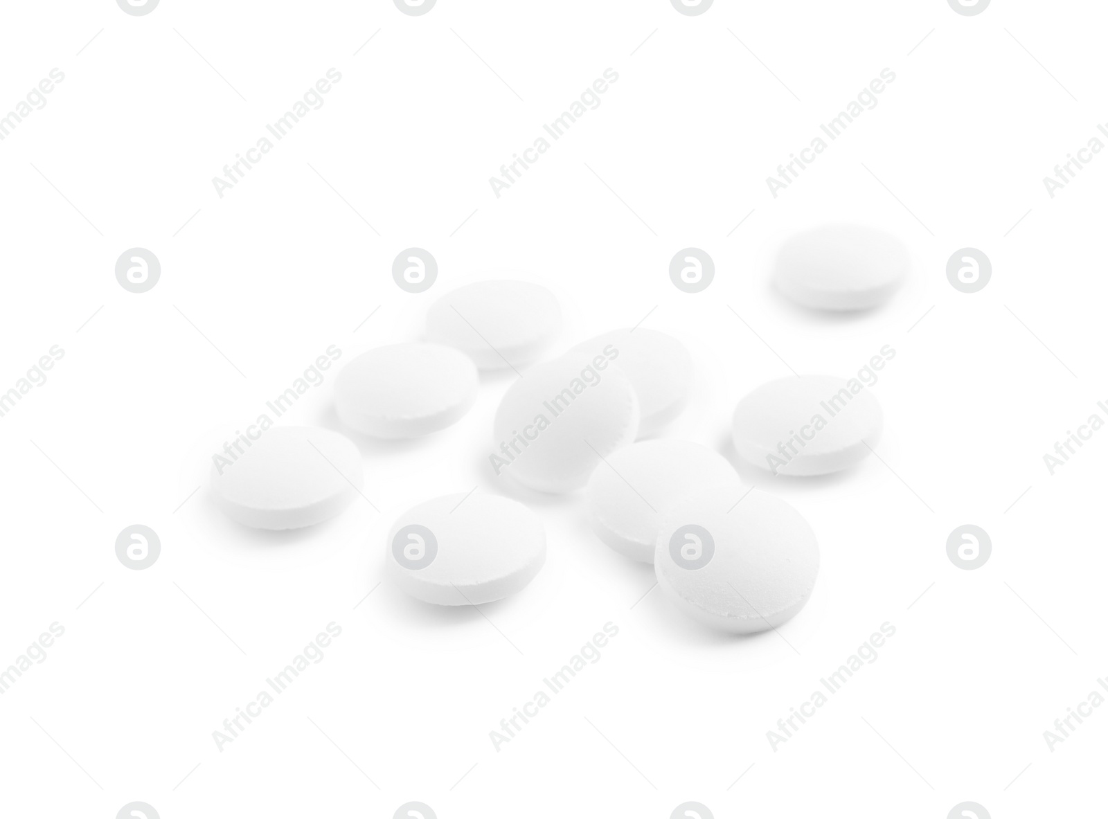 Photo of Many pills isolated on white. Medicinal treatment