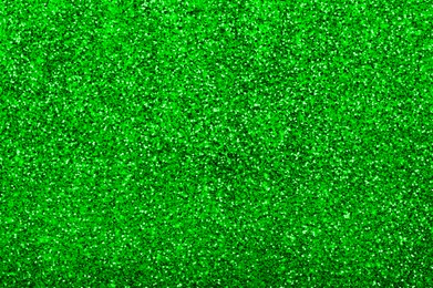 Image of St. Patrick day. Green glitter as background