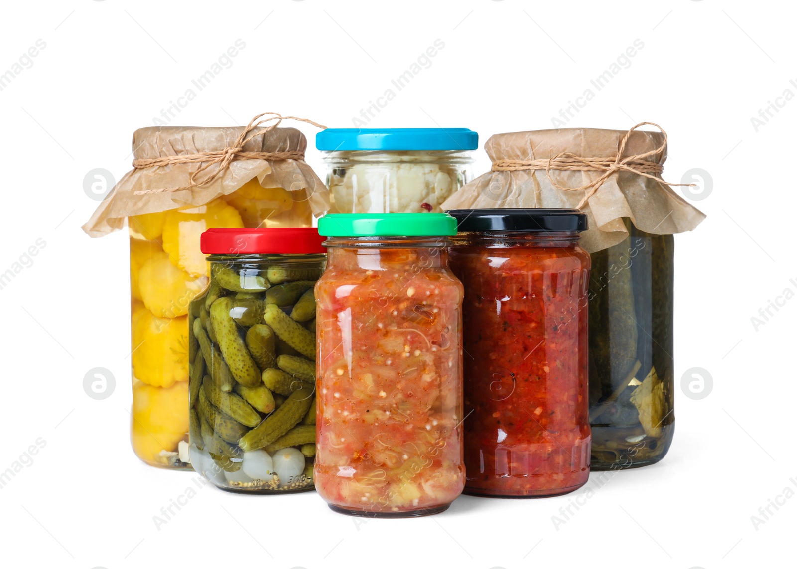 Photo of Different jars with pickled vegetables on white background