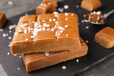 Photo of Salted caramel on slate board, closeup view