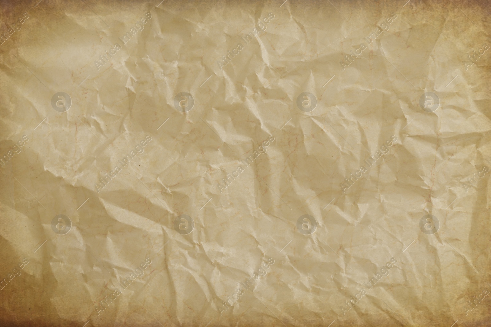 Image of Crumpled old paper as background. Texture of parchment