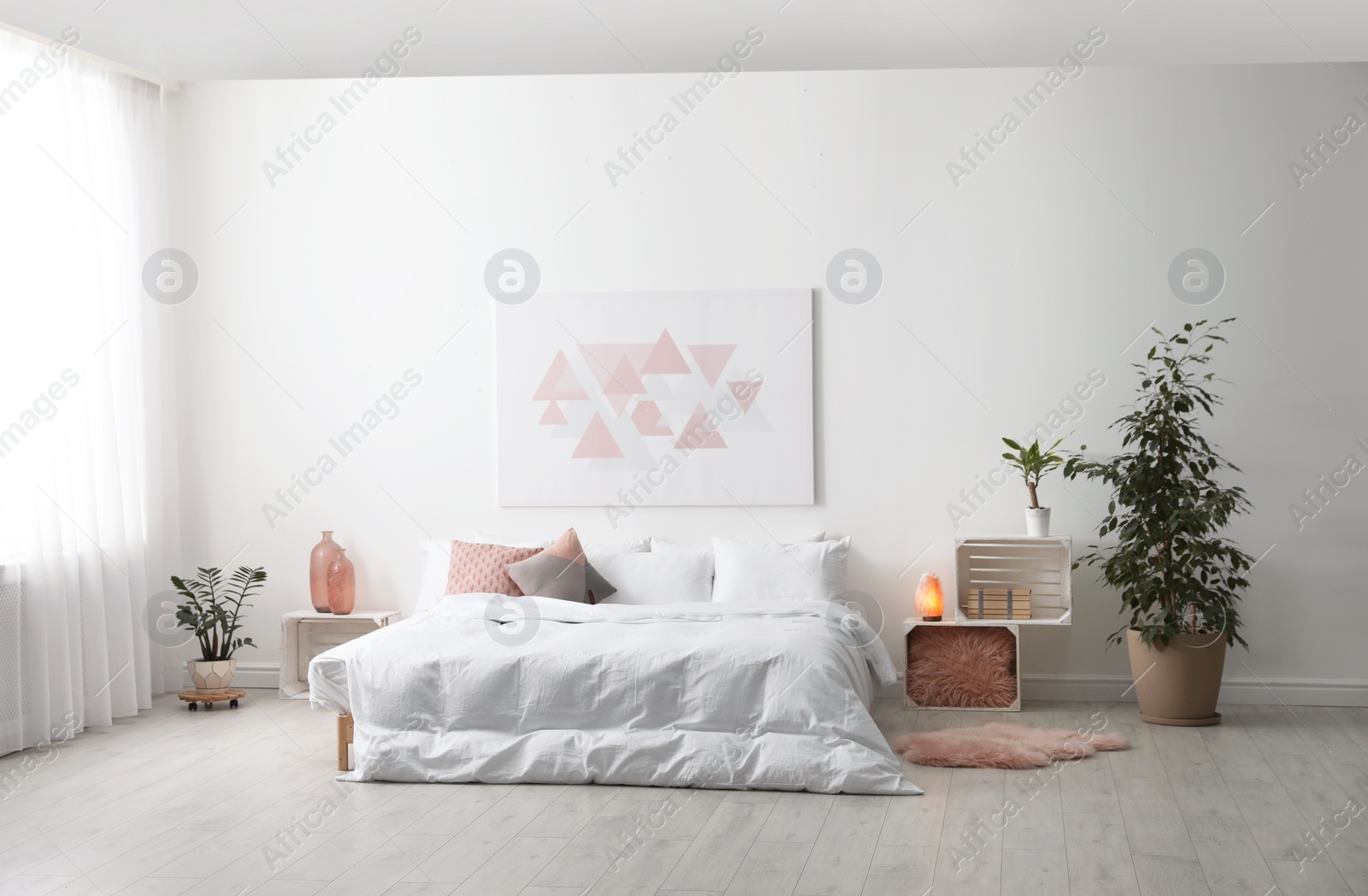 Photo of Light modern room interior with comfortable bed