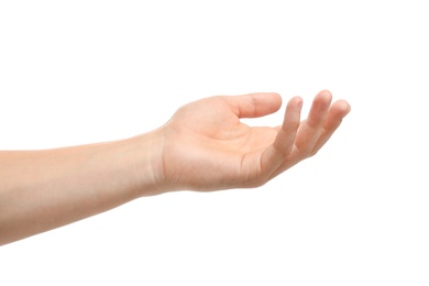 Young man held out hand on white background, closeup