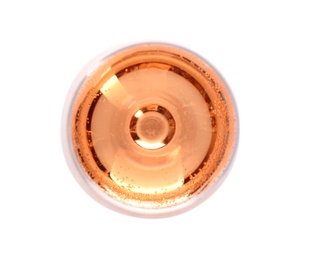Photo of Glass of rose champagne on white background, top view