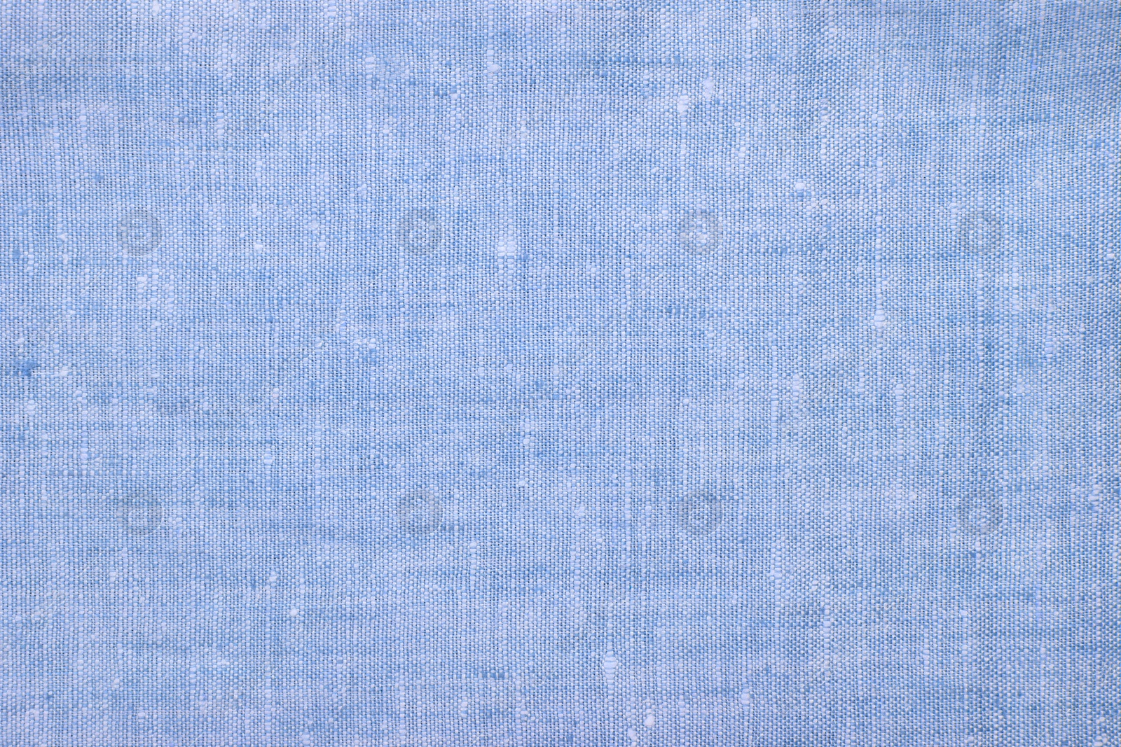 Image of Texture of light blue burlap fabric as background, top view