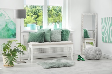 Stylish room interior with mint decor elements