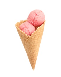 Photo of Delicious pink ice cream in waffle cone on white background