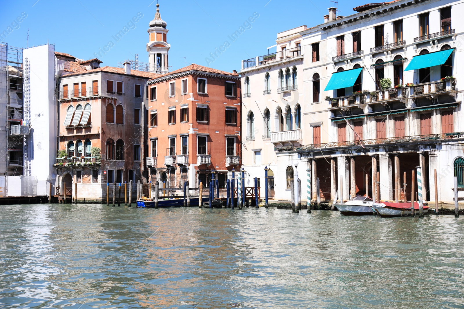 Photo of VENICE, ITALY - JUNE 13, 2019: Picturesque view of Grand Canal. Grand Canal is most famous channel in city