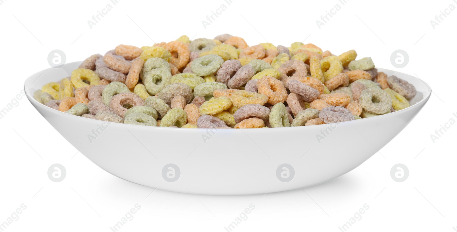 Photo of Tasty cereal rings in bowl isolated on white