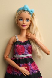 Photo of Mykolaiv, Ukraine - September 4, 2023: Beautiful Barbie doll on beige background