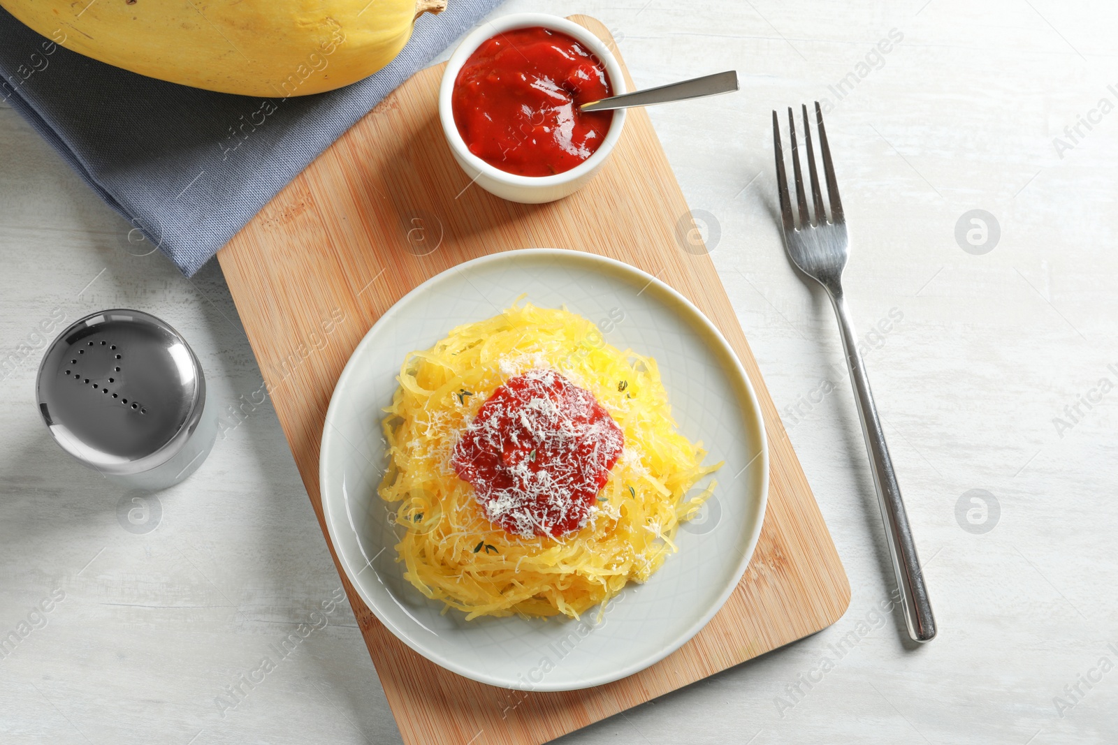 Photo of Flat lay composition with cooked spaghetti squash on white table